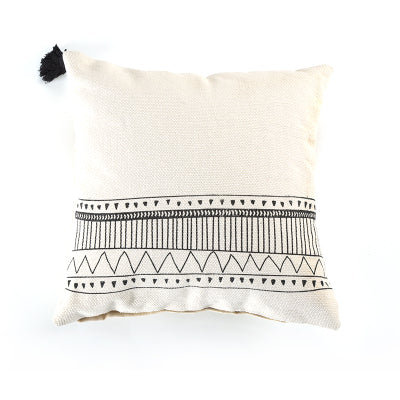 Geometric black and white tufted tassel pillow