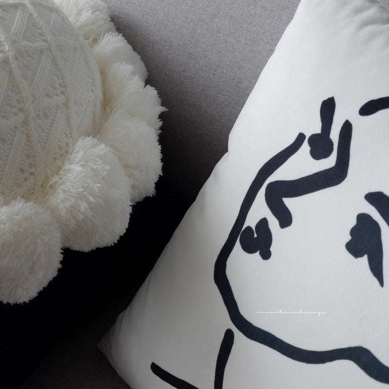 Round pillow head cushion b&B is wrapped in navy blue