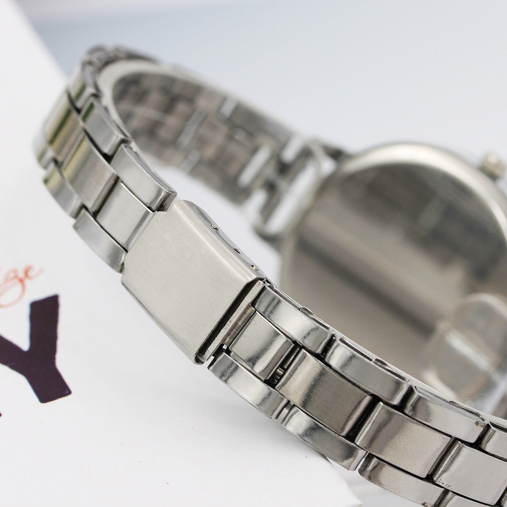 12 head nail steel belt ladies watch