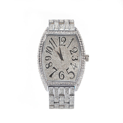 Large tonneau-shaped dial with full diamonds