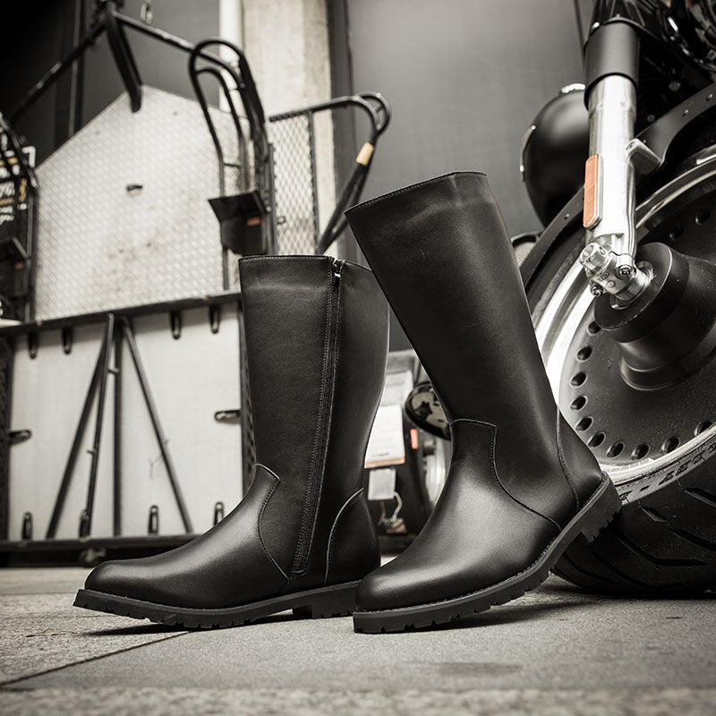 A high British boot with soft face and leather