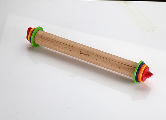 Adjustable height rolling pin