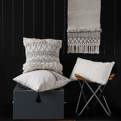 Geometric black and white tufted tassel pillow