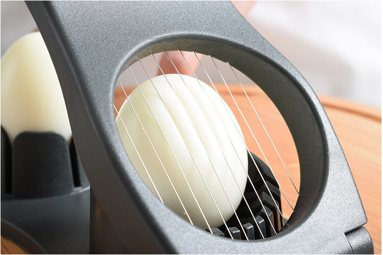 Double-head plastic two-in-one egg slicer